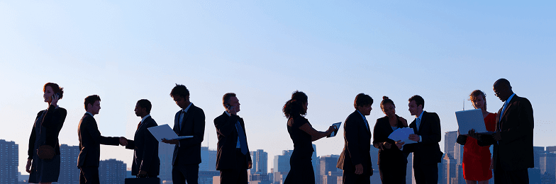 Business colleagues on rooftop talking